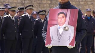 Une photo d'Arnaud Garcia lors de l'hommage national aux deux agents pénitentiaires tués dans l'attaque d'un fourgon dans l'Eure